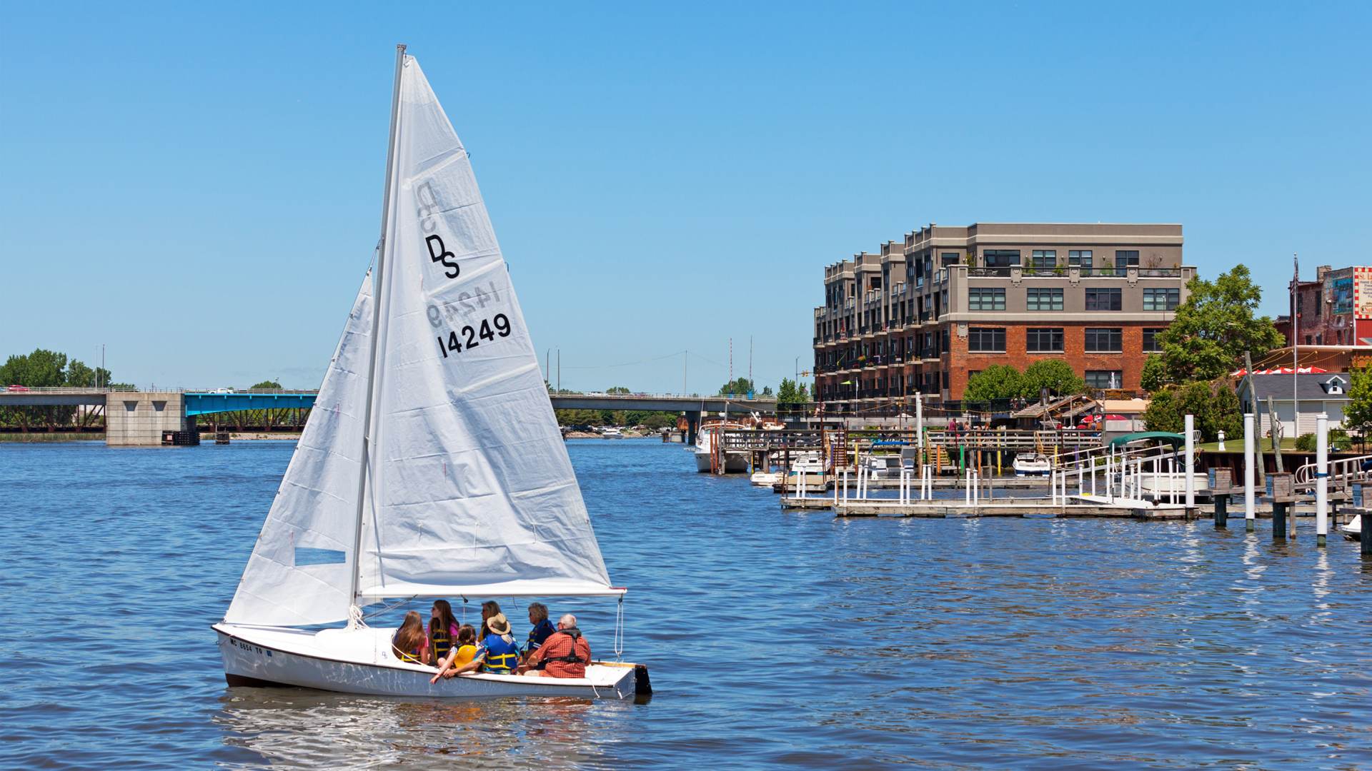 Sailboat on the Saginaw River with views of Downtown Bay City