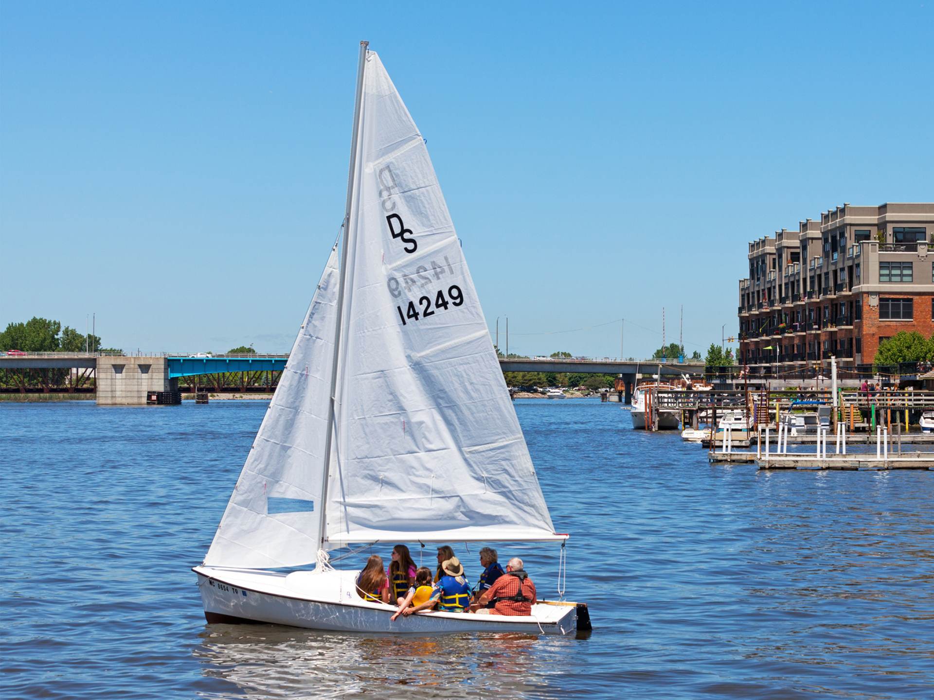 Sailboat on the Saginaw River with views of Downtown Bay City