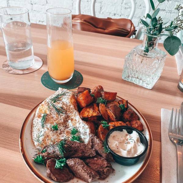 Steak and Egg Breakfast with a mimosa at The Public House in Bay City