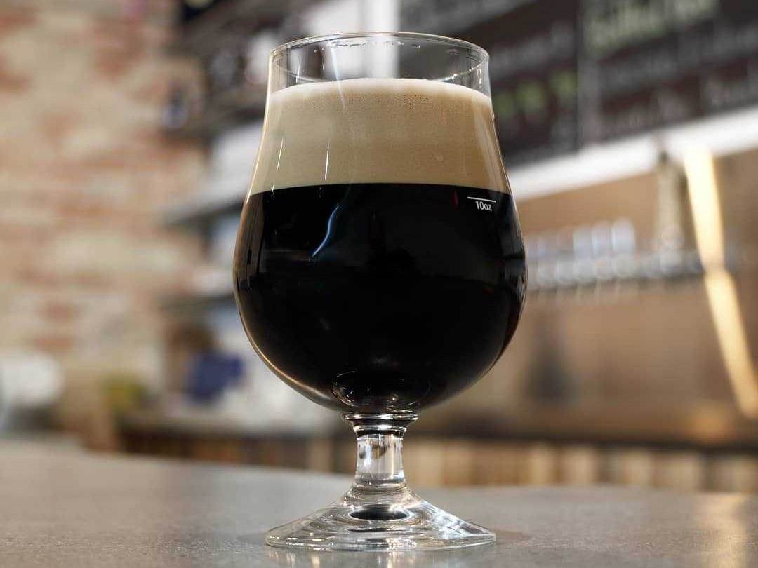 Belgian Beer glass filled with a fresh pour at Oracle Brewing Co. in Saginaw
