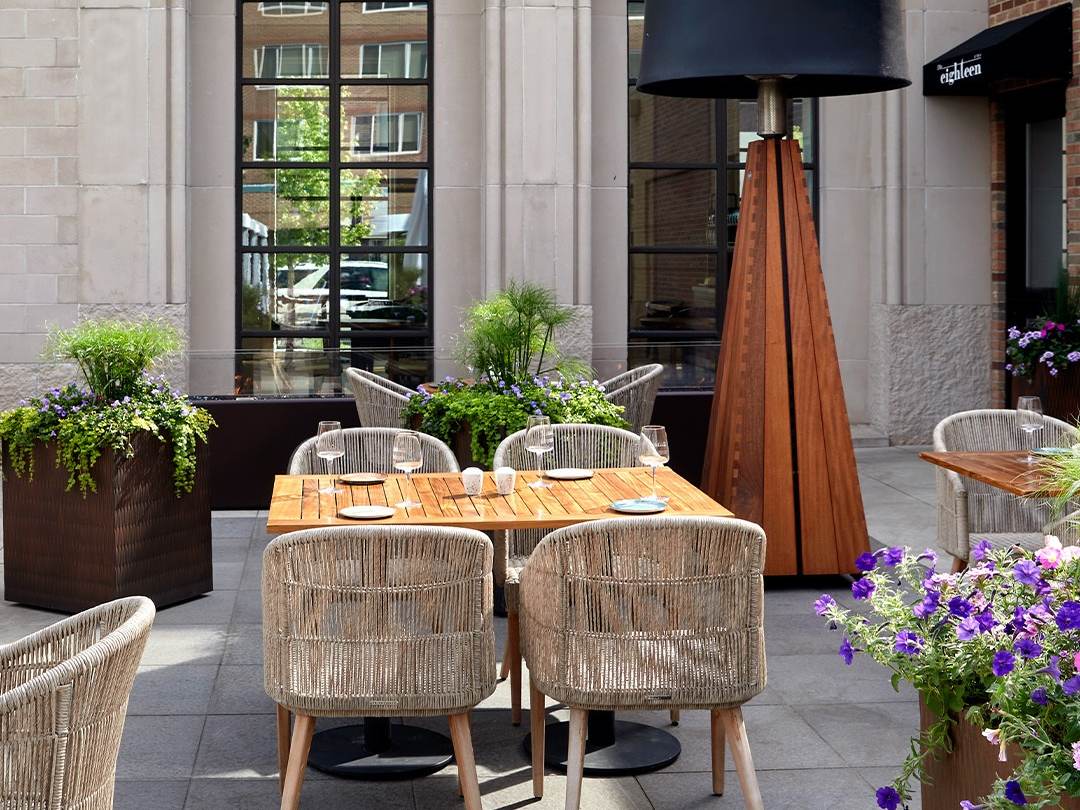 Gorgeous views of the summery outdoor dining patio at ONe Eighteen at The H Hotel in Downtown Midland, Michigan