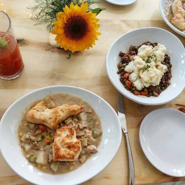 Potpie with Michigan-shaped biscuits and a bloody Mary, beautifully plated at MI Table in Bay City