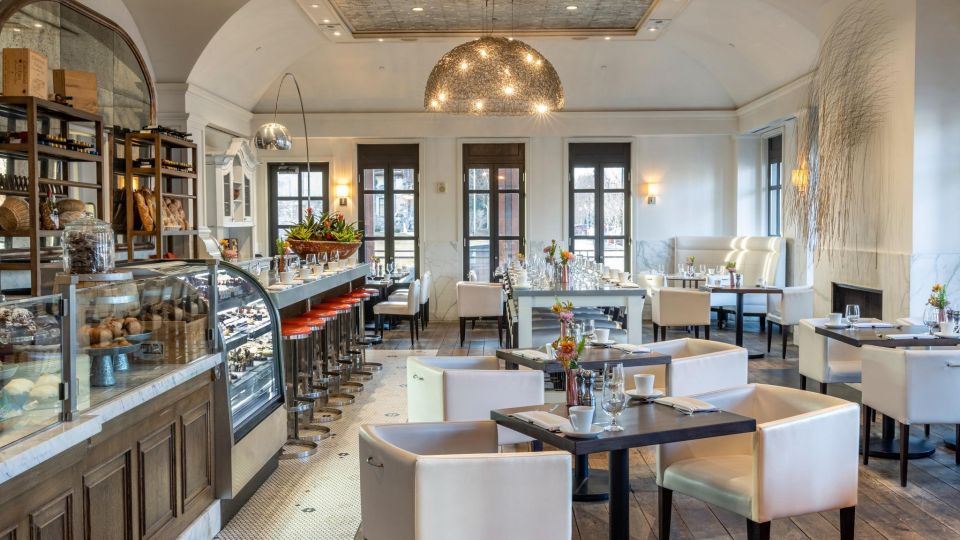 Views of the elegant bistro interior & pastry counter inside Cafe Zinc at The H Hotel in Downtown Midland, Michigan.