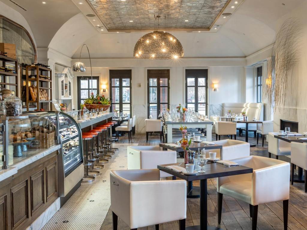 Views of the elegant bistro interior & pastry counter inside Cafe Zinc at The H Hotel in Downtown Midland, Michigan.