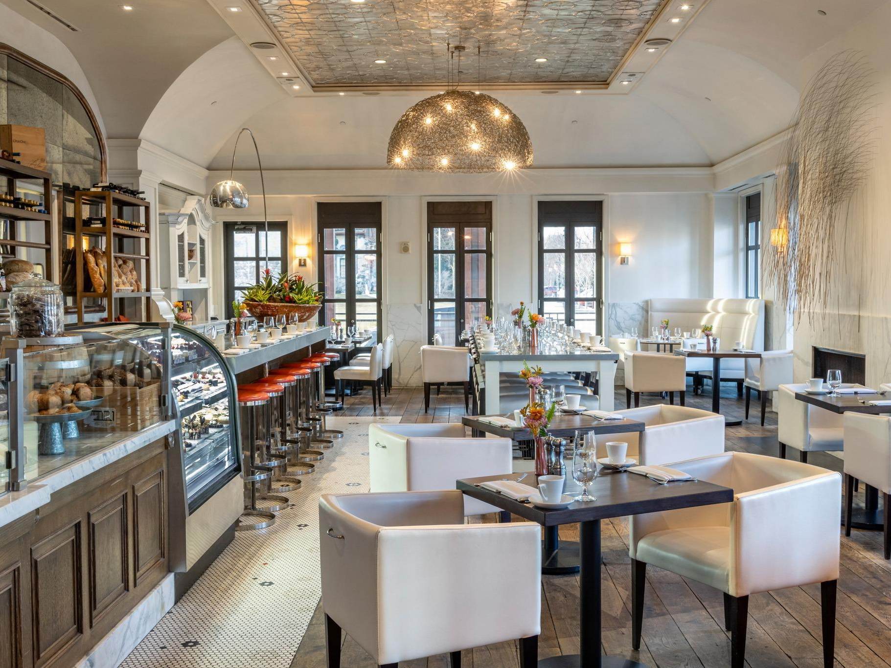 Views of the elegant bistro interior & pastry counter inside Cafe Zinc at The H Hotel in Downtown Midland, Michigan.