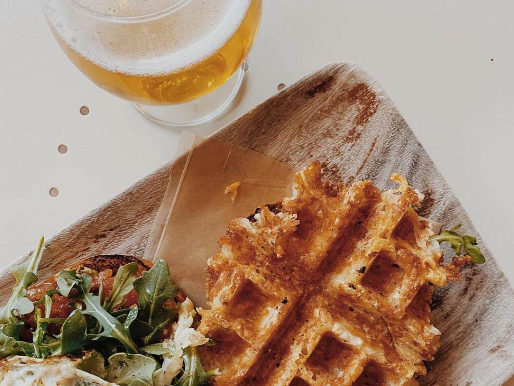 Beautifully plated breakfast sandwich at Harless + Hugh Coffee in Bay City