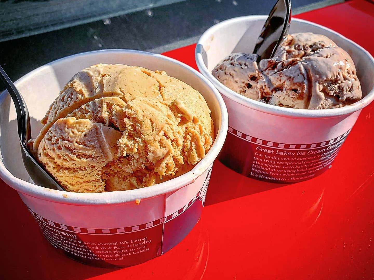 Two to-go cups of artisanal ice cream from Great Lakes Ice Cream Company in Midland