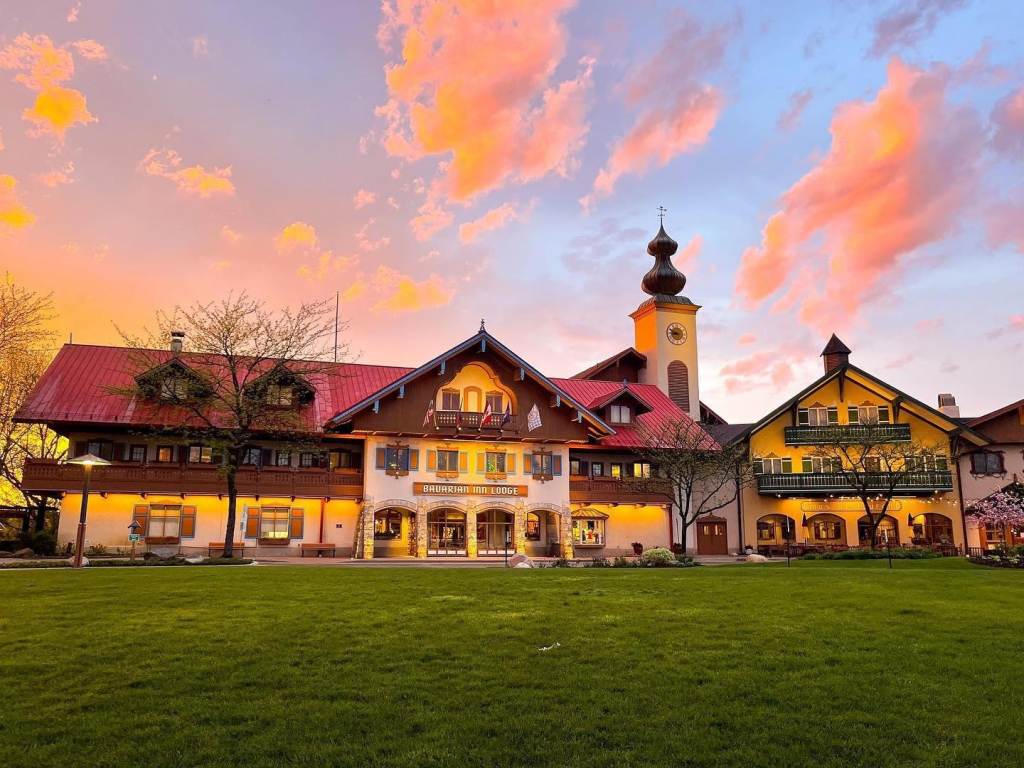 Stunning exterior views of the Bavarian Inn Lodge in Frankenmuth with a cotton-candy sunset backdrop