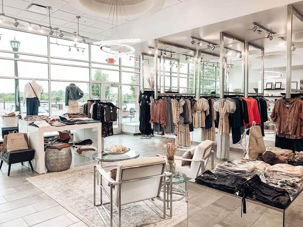 Interior of OMONI Boutique in Uptown Bay City on a bright, sunny day