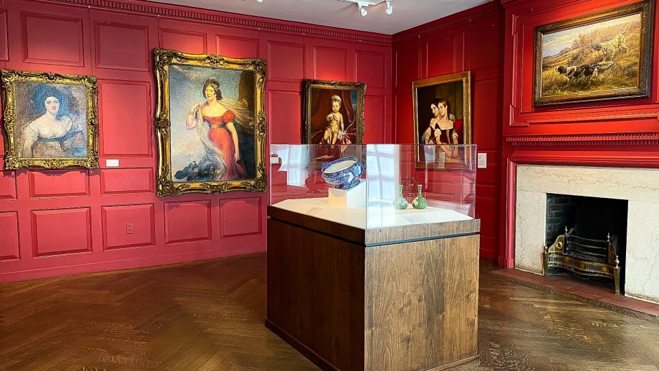 Paintings and pottery on display inside the Saginaw Art Museum in Saginaw