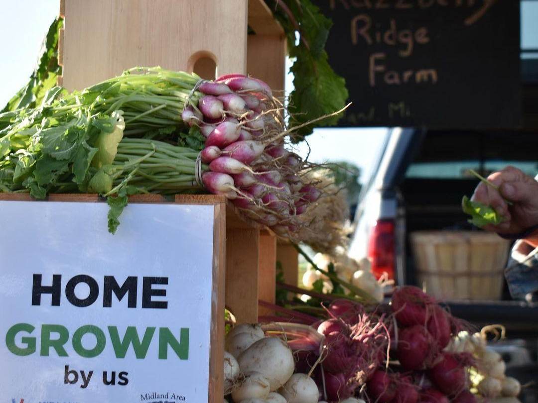Produce from Razzberry Ridge Farm for sale at the Midland Area Farmers Market in Midland