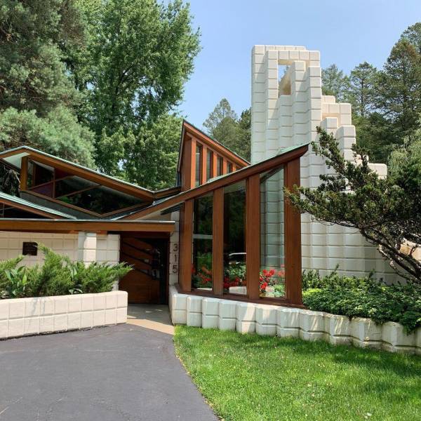 Views of the entrance to the Alden B. Dow Home & Studio in Midland on a sunny day