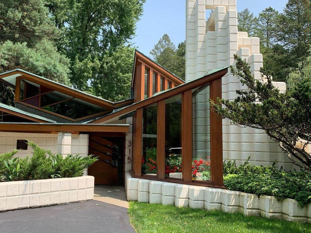 Views of the entrance to the Alden B. Dow Home & Studio in Midland on a sunny day