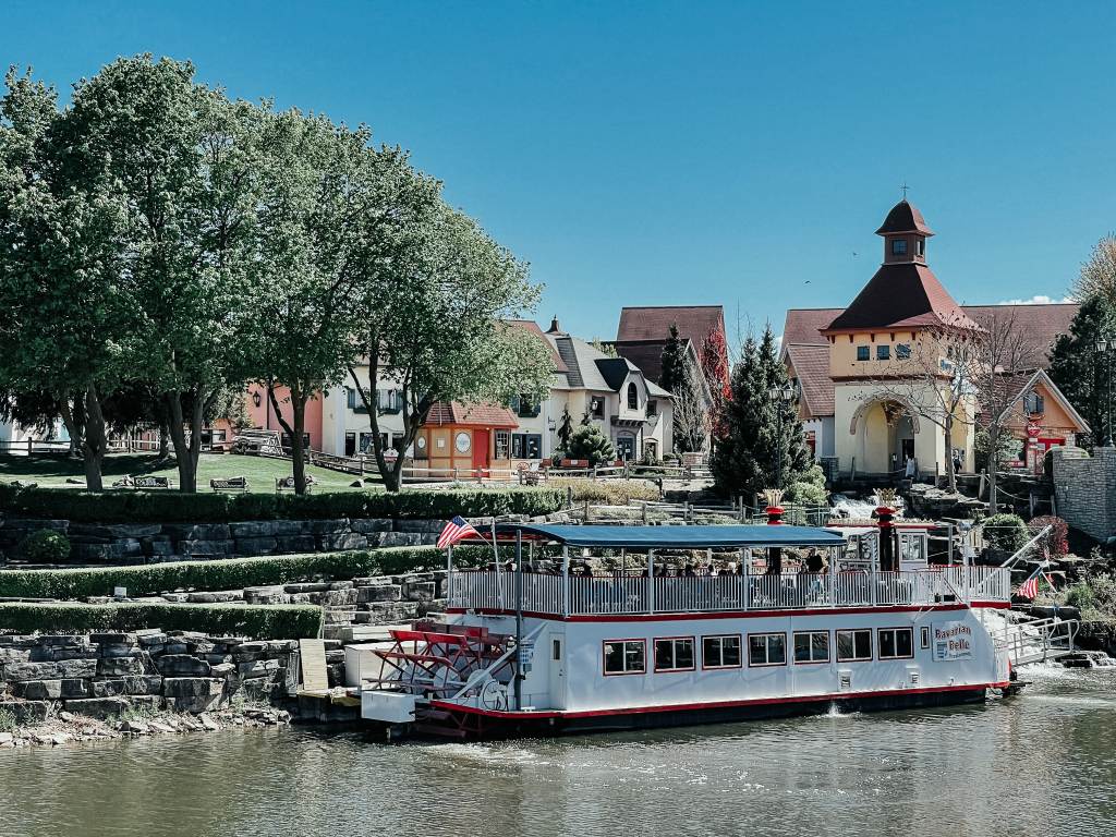 Bavarian Belle Riverboat docked by Frankenmuth River Place Shops on the Cass River in Frankenmuth